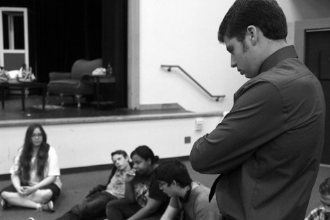Senior-director Josh Warren focusing hard on his cast during a line thru for the opening performance of "Rhinoceros."