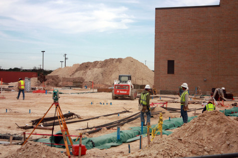 Construction workers make progress on the new science building