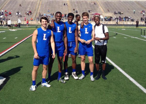Members of the boyss track team at competition