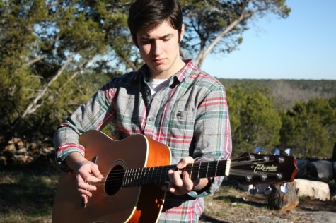 Evan Hays playing guitar.