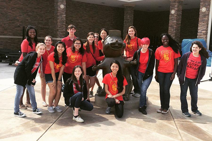 The Spanish National Honor Society posing with a Buc-ees statue.
