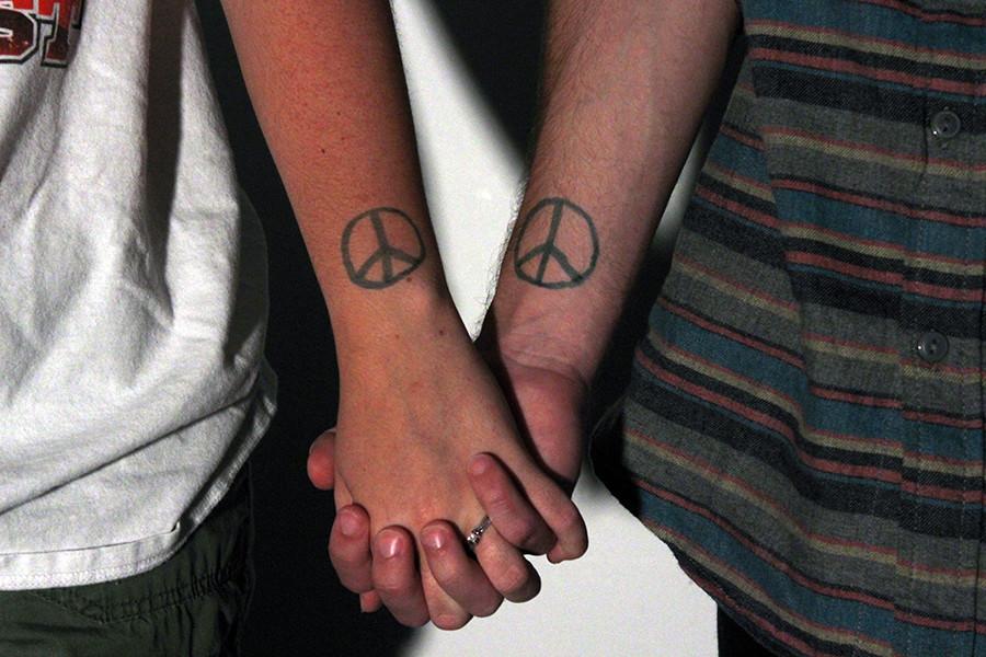 Two+powerful+signs+of+peace.+Peace+signs+originated+from+a+protest+against+nuclear+weapons+in+Britain.