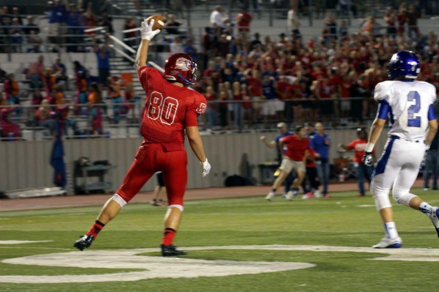 Senior Michael Berry celebrating after scoring a touchdown from a Hail Mary pass. The pass came from 4th and 33.
