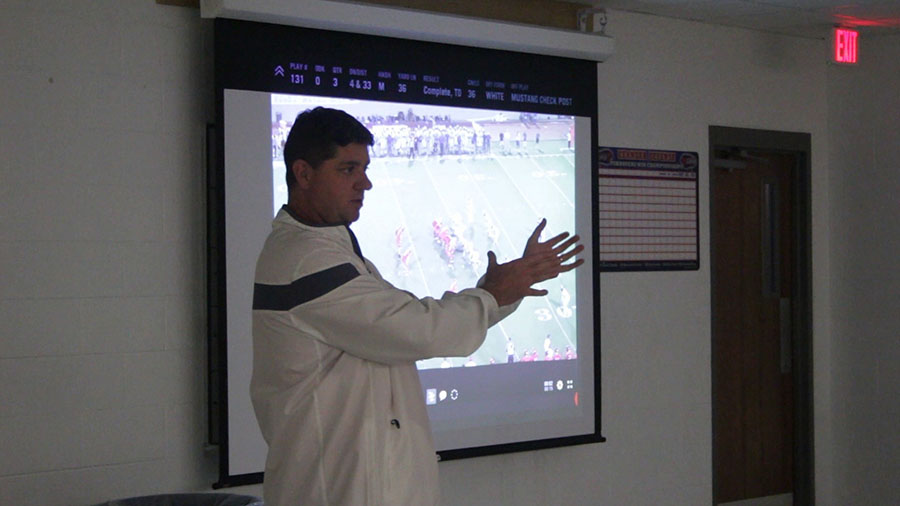 Head Coach Tim Smith talking about the deep touchdown pass during the Georgetown game. The coaches review last week's game and talk about the current week's game.