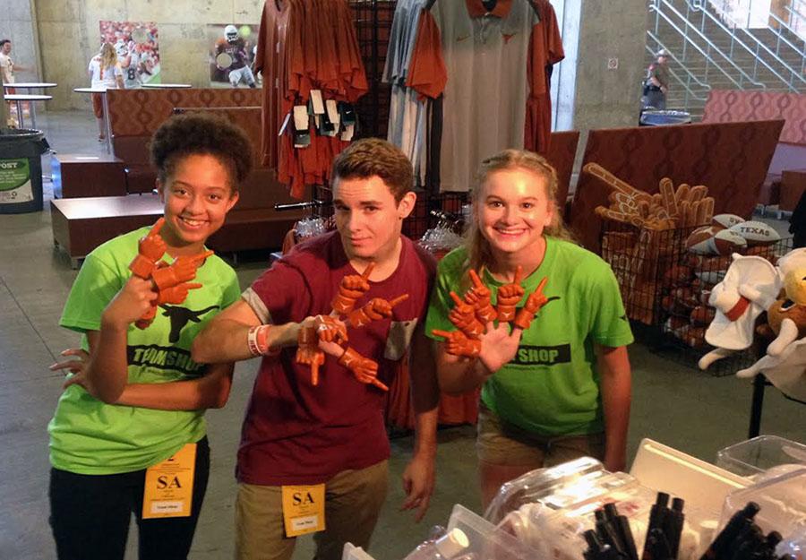 Freshman Bri Branscomb and juniors Patrick Wilbanks and Miranda Pizer taking a small break from their work. Since the work day is 13 hours, all volunteers are required to take breaks.