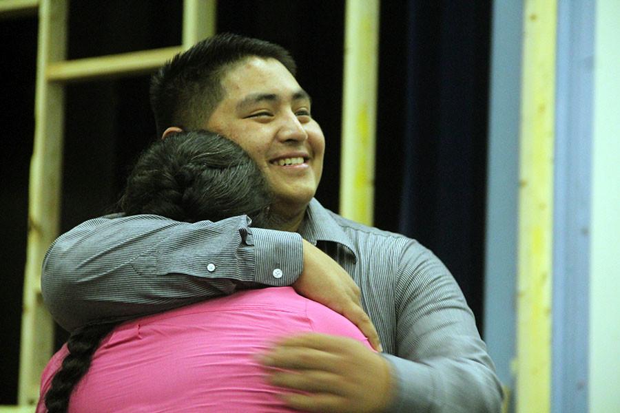 Senior Chris Ruiz hugging his mother after he spoke about her.