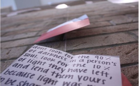 Note cards on the anti-bullying mural. All across the mural are note cards with positive messages.