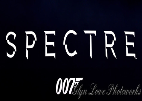The title card for the new film. It stars Daniel Craig, Christoph Waltz,  Léa Seydoux, and Ralph Fiennes and is rated PG-13.