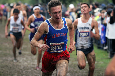 Rob Coe racing to the finish line after it had begun raining during the start of the race. He placed 55th.