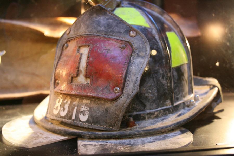 A firefighter helmet displayed at a museum that was recovered from Ground Zero. Freshman Lisa Simmons' was also a firefighter, who suffered medical problems from inhaling fumes while fighting fires.