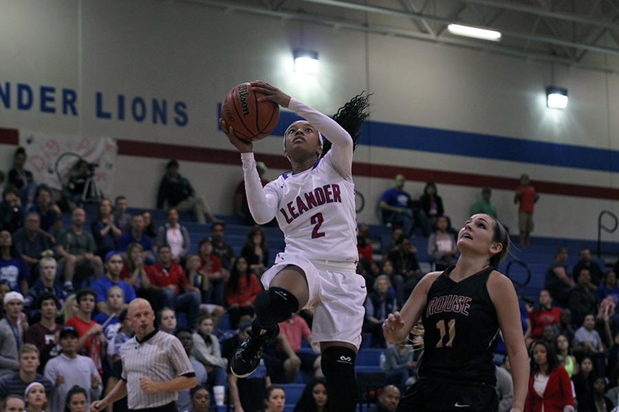 Senior Rayanna Carter shooting for the basket. Carter finished the game with 26 points.
