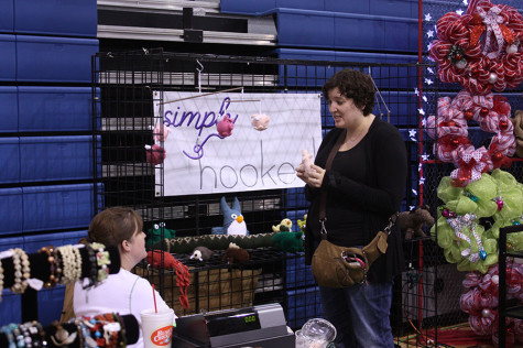 One of the many vendors at the Craft Market. The craft market is held by the baseball booster club.