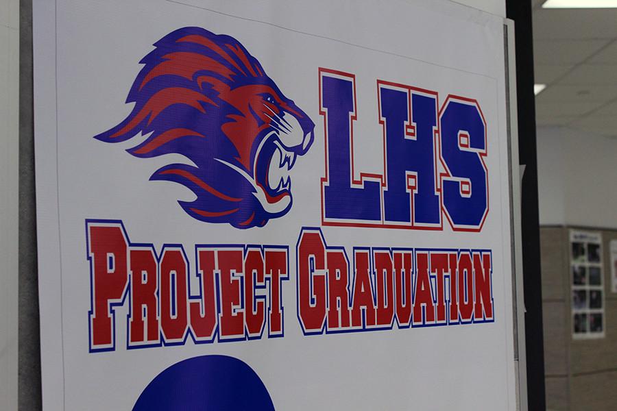 The project grad poster near the cafeteria. It is used to show the amount of profit raised by the organization.