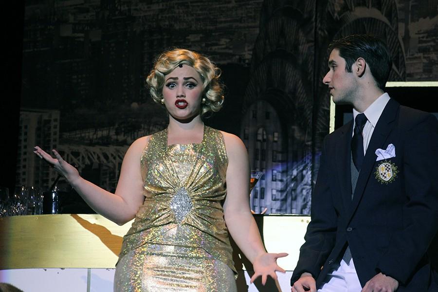 The opening scene of the musical with two of the leading actors, senior Lynley Eilers and junior Evan Hays who played the roles of Reno Sweeney and Billy Crocker. These two have a on-and-off relationship throughout the show, but discover that theyre just friends and work together to marry their true loves.