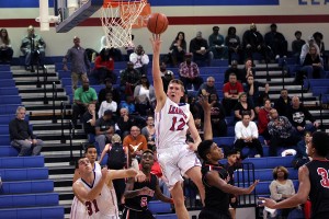 Junior Chase Cotton shooting for two points against Vista Ridge. Cotton scored 16 points in the game.