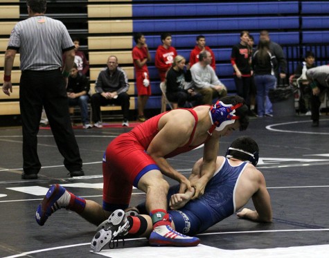 A wrestler competes at the Delco meet. The boys wrestled to 7th place in the tournament.