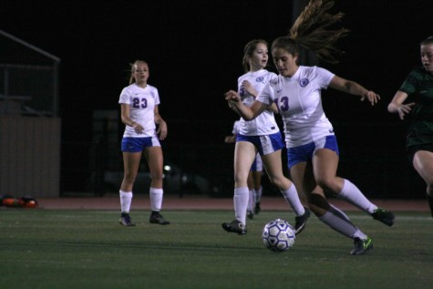 Junior sweeper Kyah Carlson #13 taking the ball away from the Timberwolves in Bible Stadium. Against Cedar Park, the Lady Lions would soon lose with a score of 0-4.