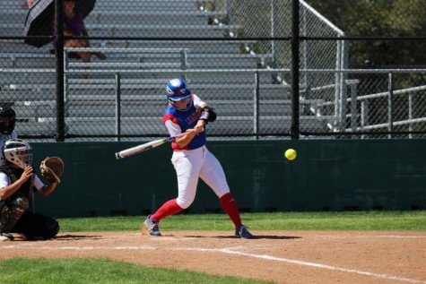 Senior Hailey MacKay about to hit the ball that would allow the Lady Lions to score. The Lady Lions won the game against Vandegrift 13-0.