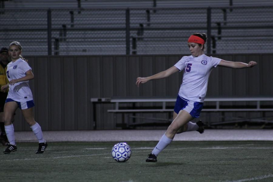 Junior holding middle TJ Barrett against the Dripping Springs Tigers. The Lions final game would later honour the two seniors and end in a tie of 1-1.