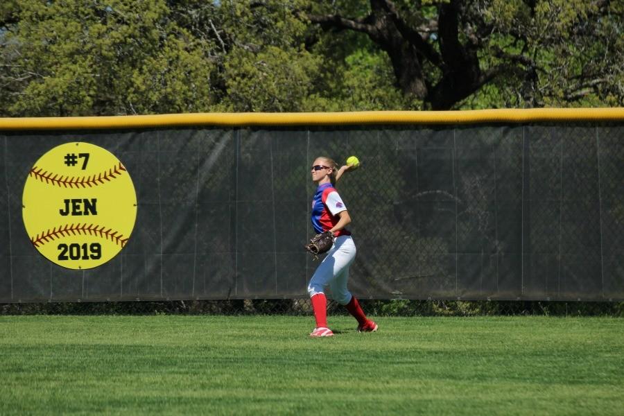 Senior Gabby Walton throwing from the outfield. In the Cedar Park game, Walton made a catch that forced Cedar Park out.
