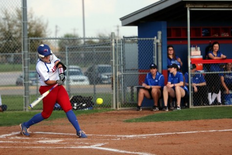 Senior Hailey MacKay about to hit a ball against Georgetown. MacKay had three single hits during the game.