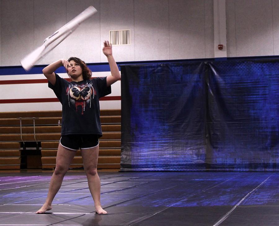 Senior Rachel Ellis practices for winter guard. They finished their last meet in second place.