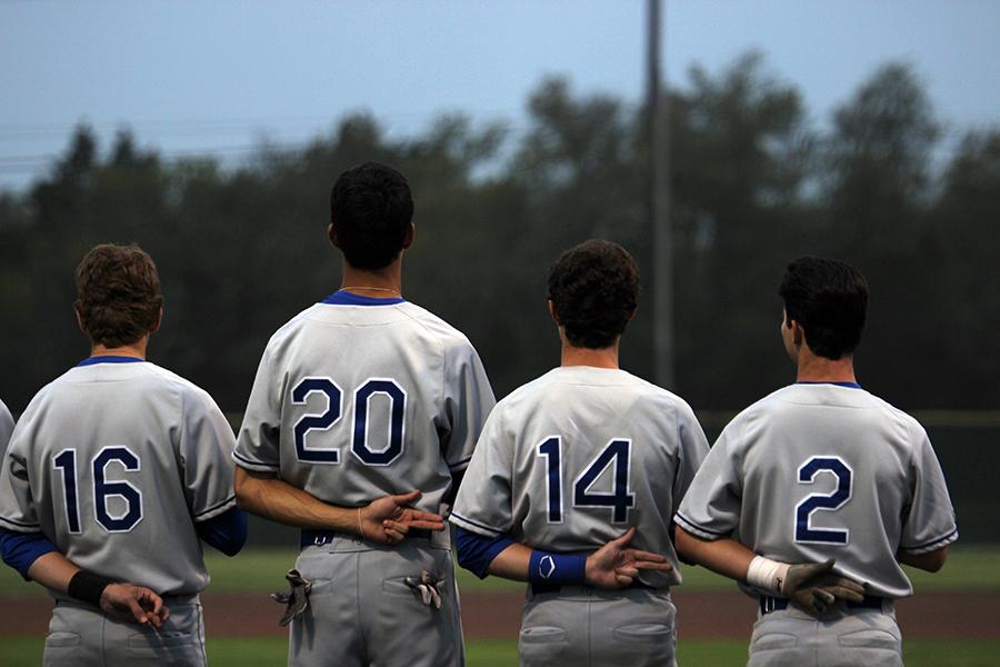 The Lions doing the national anthem before the game. Waiting in line are seniors Joel Miller, Cameron Castillo, Jason McCall and Parker McCoy.