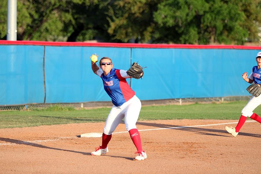 Senior Hailey MacKay throwing to first base. MacKay had one single hit in the game.