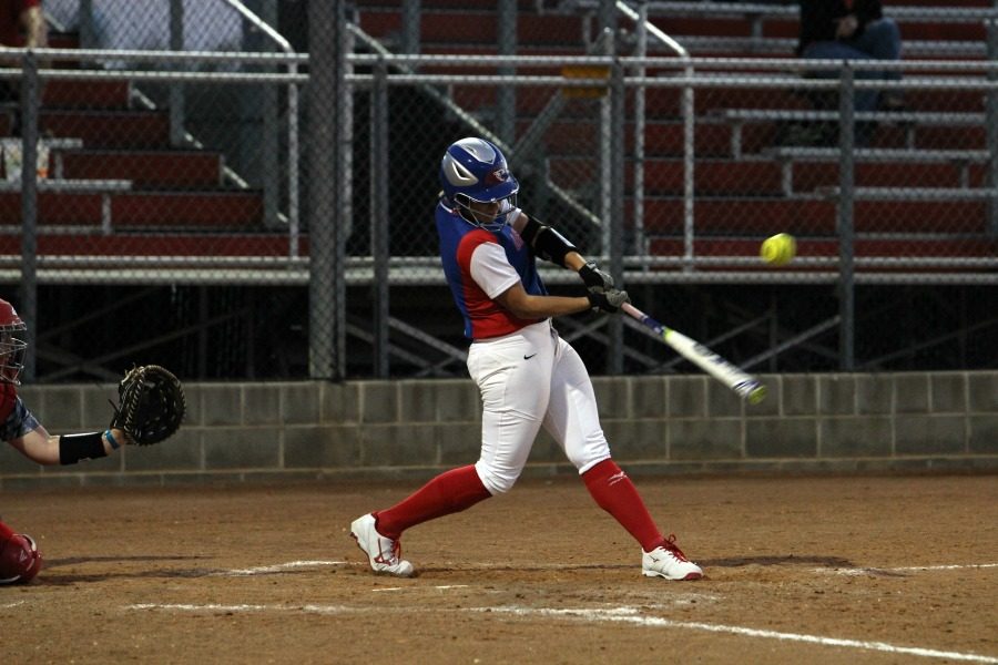 Senior Hailey MacKay hitting the ball against East View. MacKay hit a dinger in the seventh inning against Vista Ridge to tie the game.