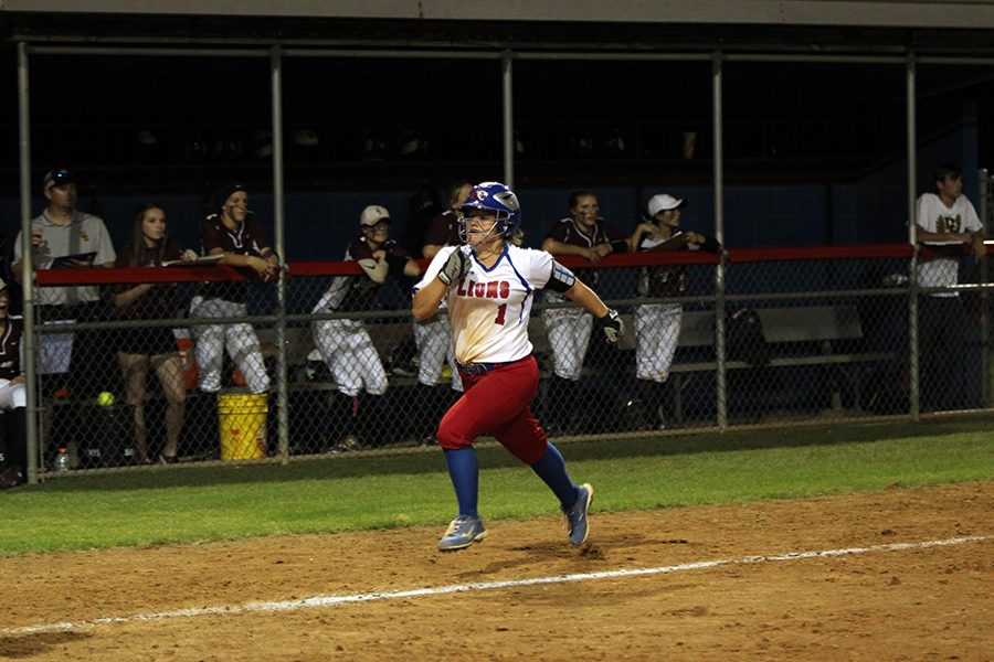 Freshman+Haley+Henderson+running+to+home+plate.+Henderson+also+had+a+series+of+steals+during+the+game.