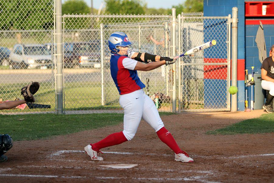 Senior Hailey MacKay hitting against Cedar Park earlier in the season. MacKay hit a grand slam in the game against East View last Friday.