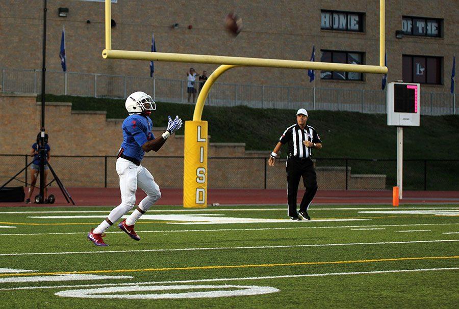 Tay Brown makes a kick off return during the varsity game against Killeen.