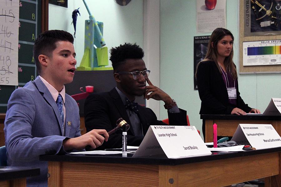 Jared Bouloy (far left) gives the ruling that the bill being presented will not be adopted. This is Bouloy’s third year participating in Youth and Government.