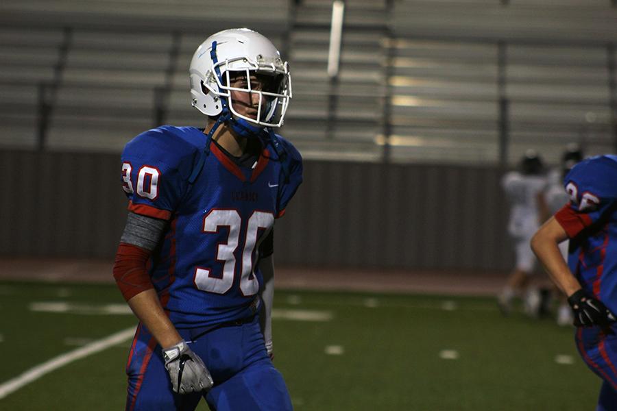 Sophomore defensive back and punter Ben Hoff walks off the field after the defense failed to prevent a score. The Lions have been unable to prevent scoring in recent games.