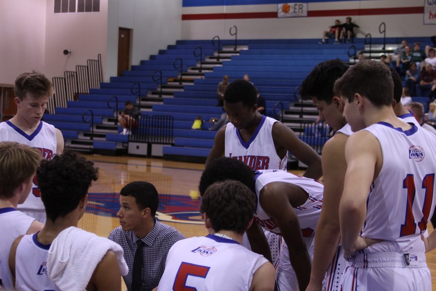 JV boys during a time out. This was the second game theyve lost this season.