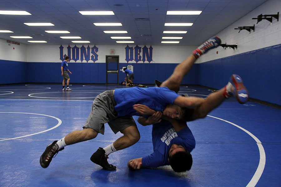 Senior+Ricky+Smith+practices+during+the+wrestling+class.+He+got+one+of+the+wins+during+senior+night.