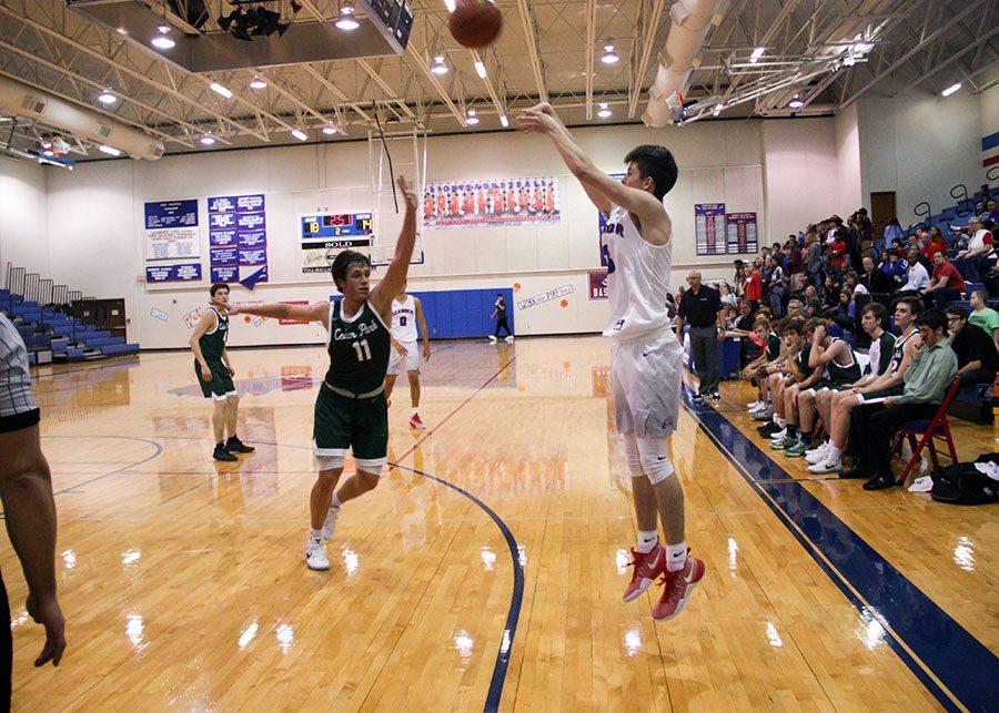 At a previous home game against Cedar Park, a Lion attempts to score. The Lions won this particular game 54-41.