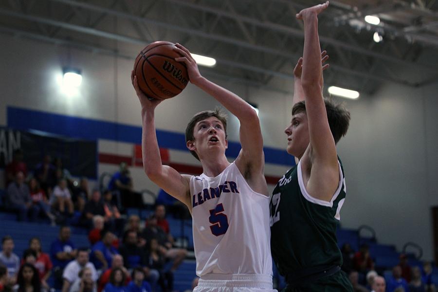 In a previous game, sophomore Hunter Stevens aims to score. Stevens is one of two sophomores on the team.