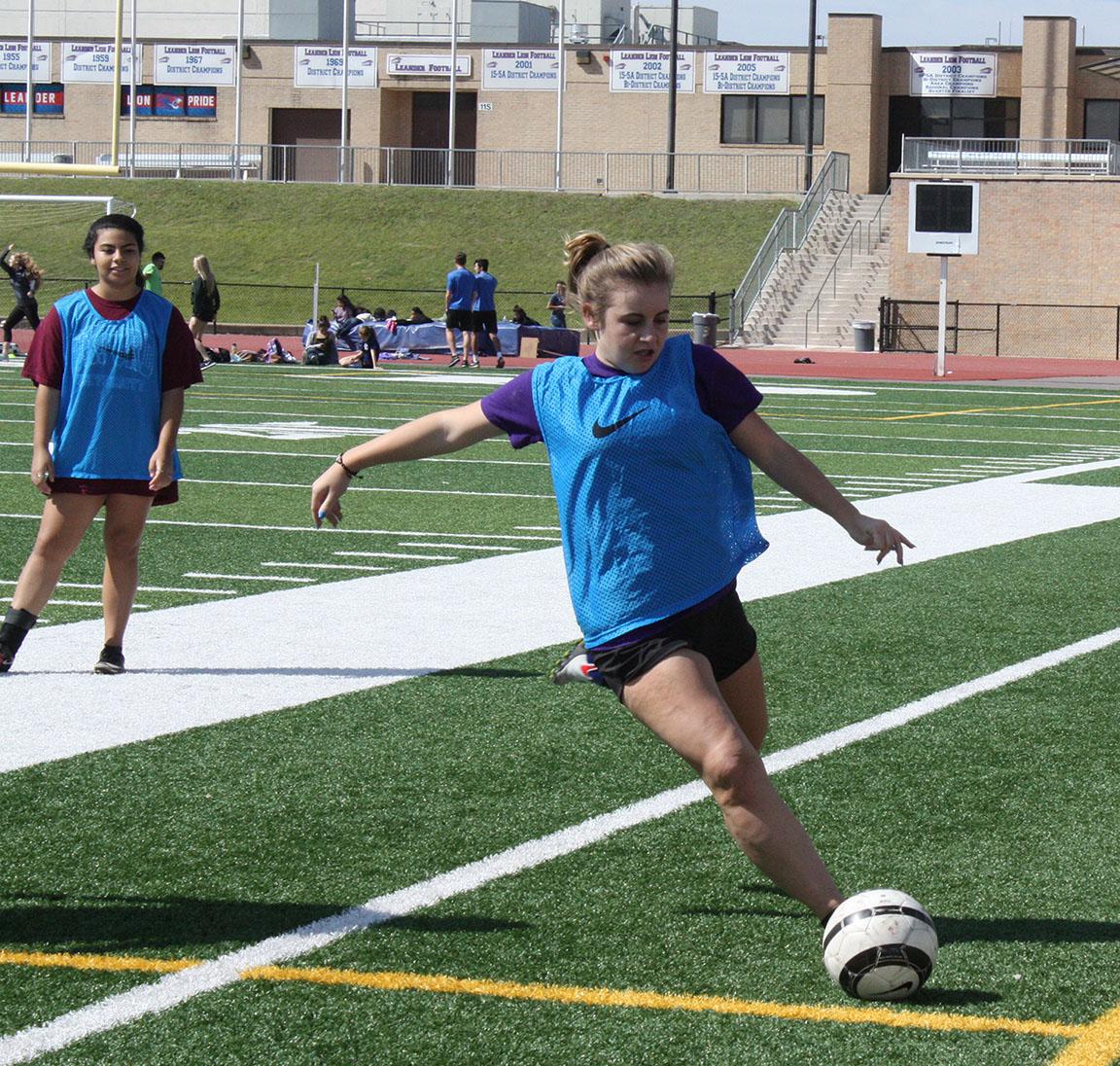 Senior Kyah Carlsen about to pass the ball to a teammate. The girls have another game and then it will be a BYE week.