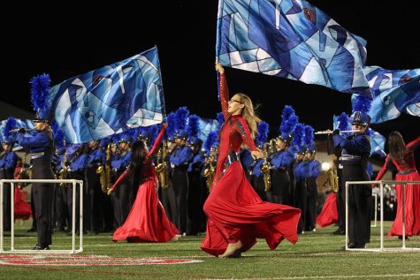 The band performs their show The Fourth Dimension during a game against Lake Travis. They placed as the 6th best performance in the nation.