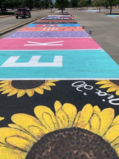 Student-painted parking spots from nearby high schools.
