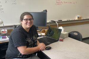 On Aug. 26, math teacher Emelie Scanlon sits behind her desk. Scanlon teaches both Algebra 1 and College Prep Math.