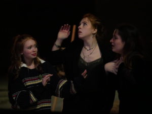 From left to right, freshmen Sophia Straus as Bridget Gilboy, junior Lelah Moeller as Erin Finnegan-Gilboy and junior Ashley Ethridge as Maggie Finnegan.