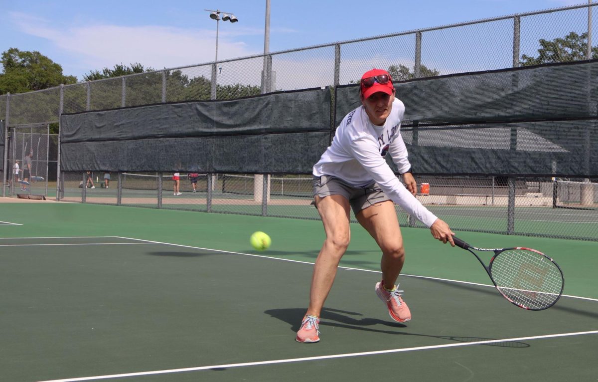 Students and staff double up for tennis tournament