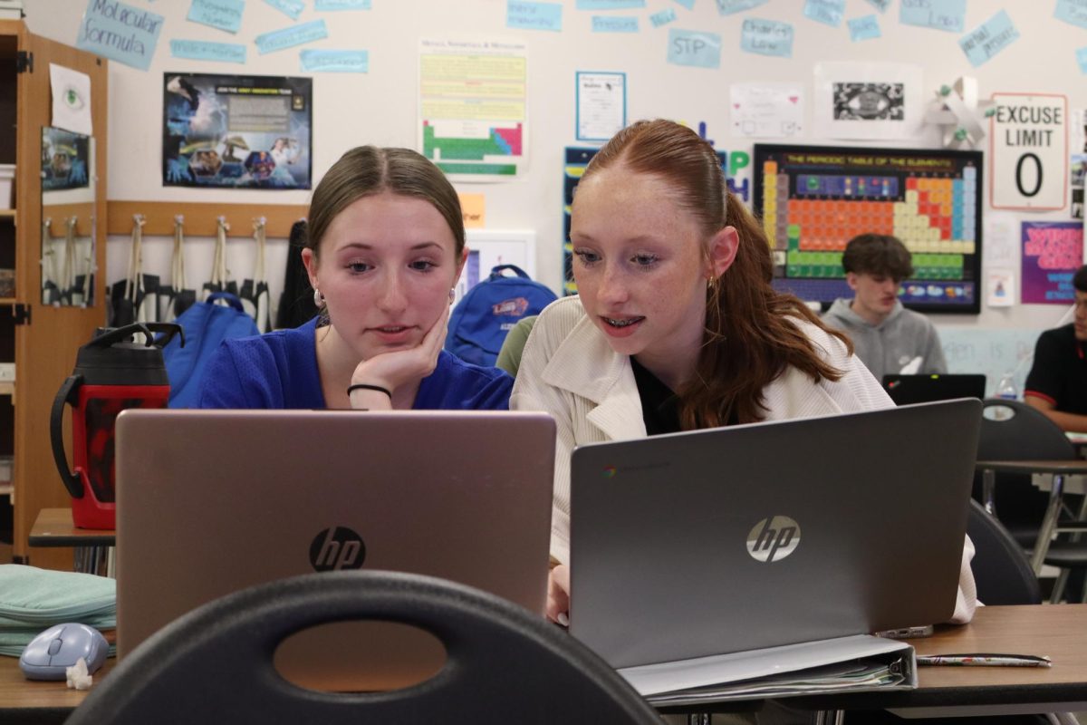 Sophomores Alyssa Martin and Abigail Martin study for the STAAR test in Mr. Stephens chemistry class on April 25.