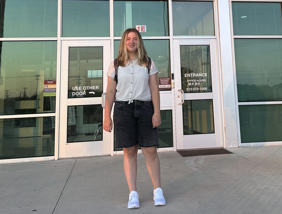 Halstenberg poses at the front of the school before her first day, Aug. 13, after arriving only days prior.