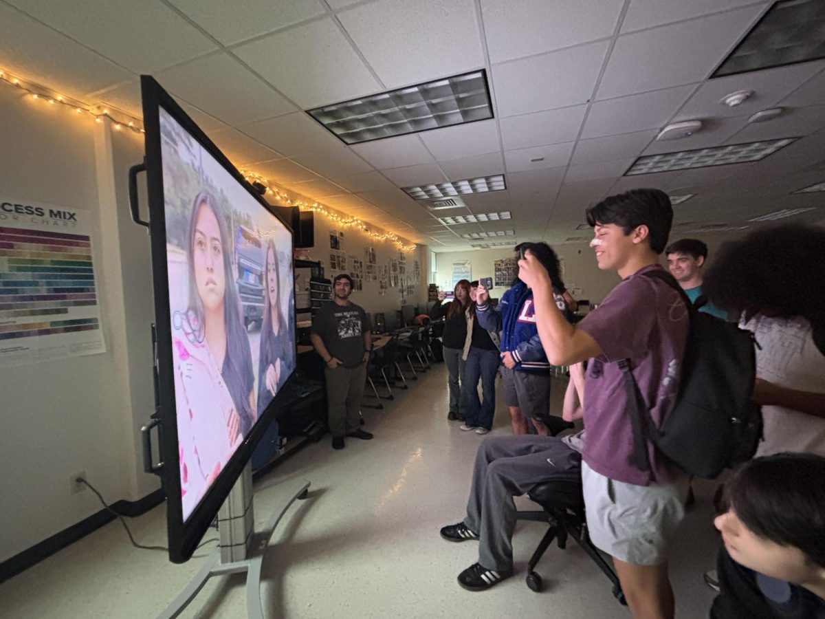 Students watching KVUE live coverage to get updates on the investigation.