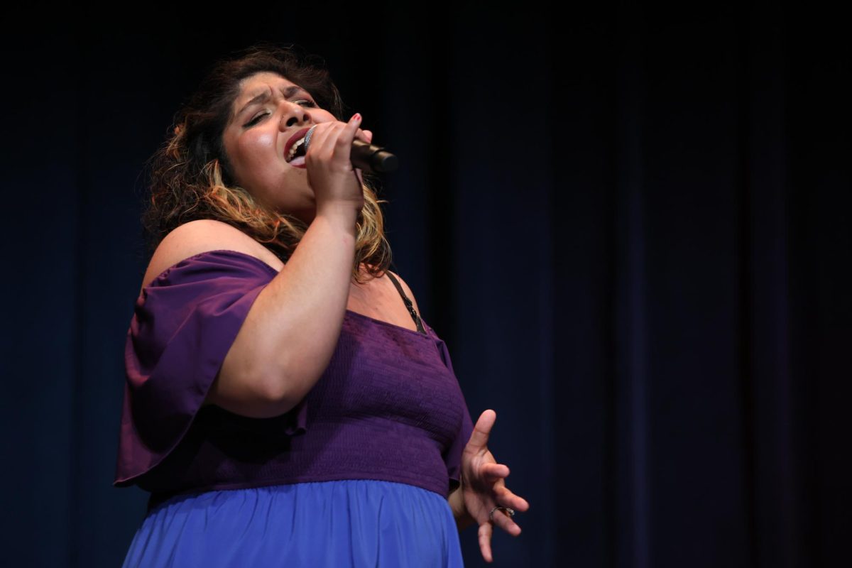Alexandra Comer sings Si Una Vez by Selena at the NHS talent show on April 2.