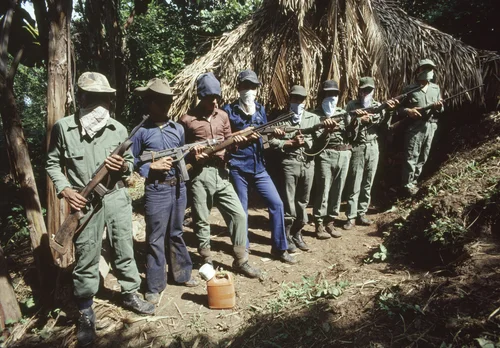 Left-wing rebels line up during training. Photo contributed by Victor Loera-patino