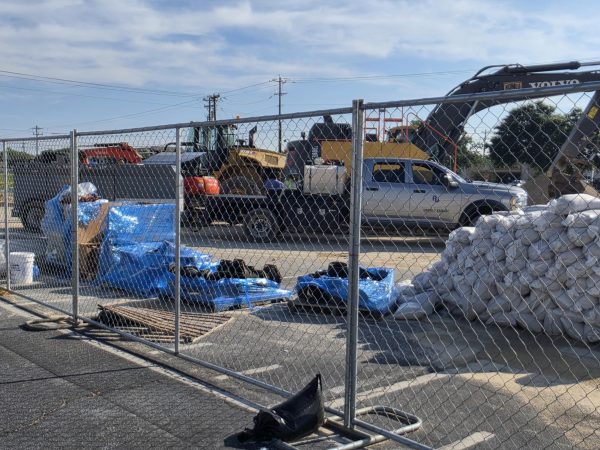 Blacktop construction impacts band